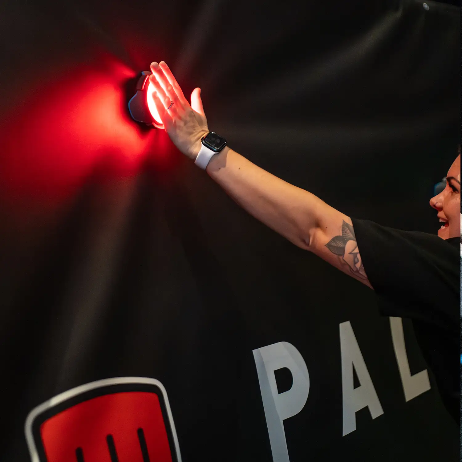 Slapping the BlazePod device in the speed zone speed wall